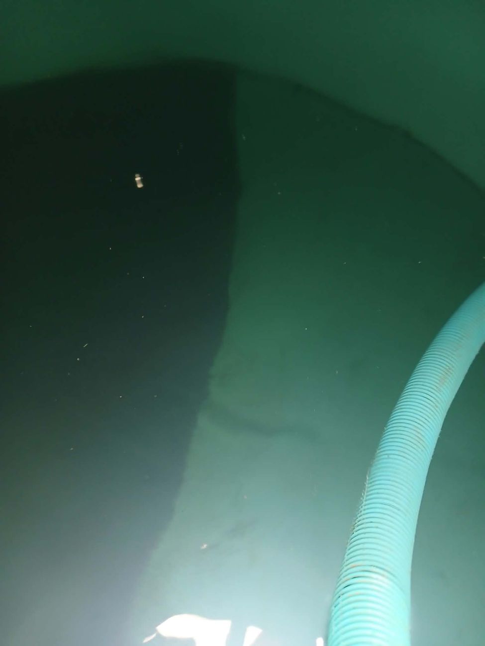 Inside a water tank during cleaning
