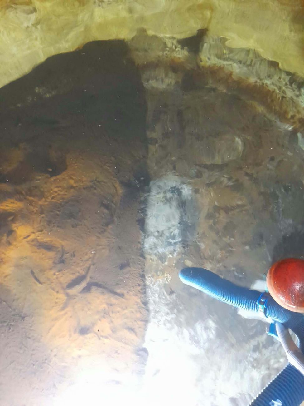 Build-up on a tank floor